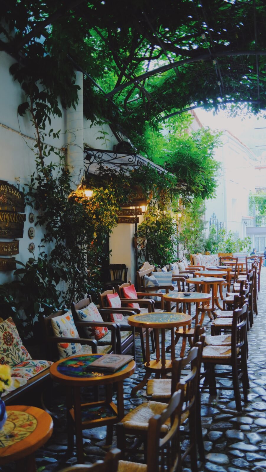 Chairs lined up along the wall at a restaurant in Agiassos, Lesvos