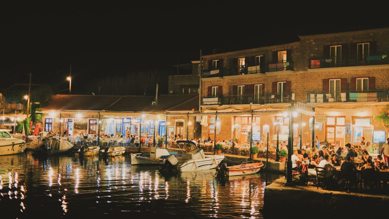 Greek tavernas at Molyvos harbour in the evening