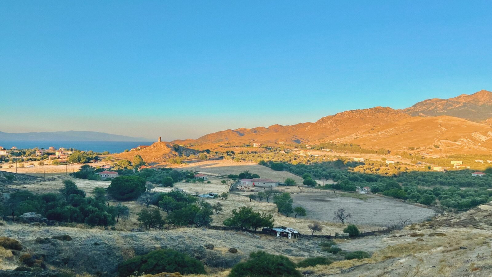Scenic hillside landscape at sunset, Greece