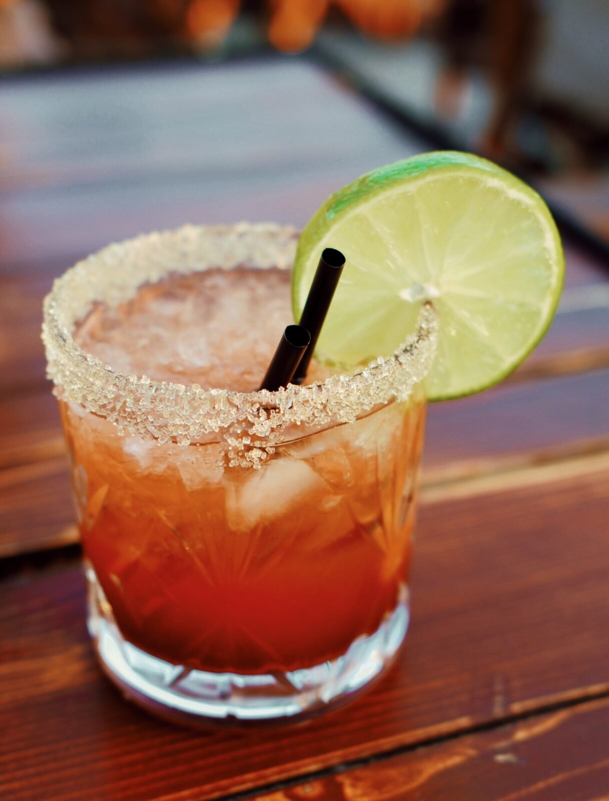 A cocktail with a lime wheel and sugar rim served at a bar in Molyvos, Lesvos