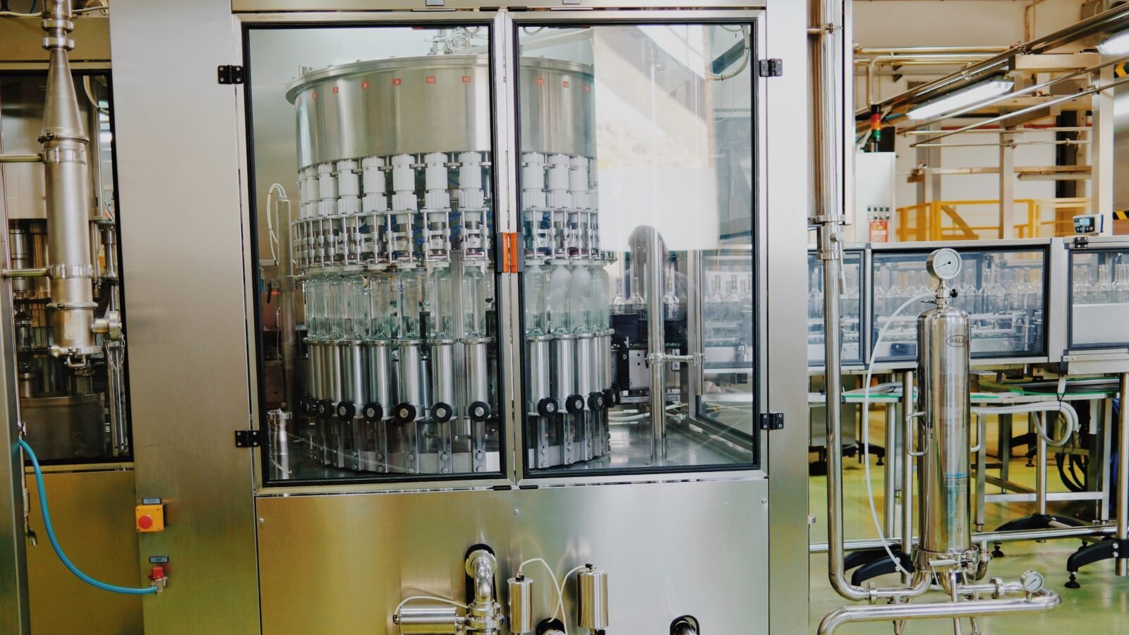 Modern bottling line filling ouzo bottles at Ouzo of Plomari distillery, Lesvos