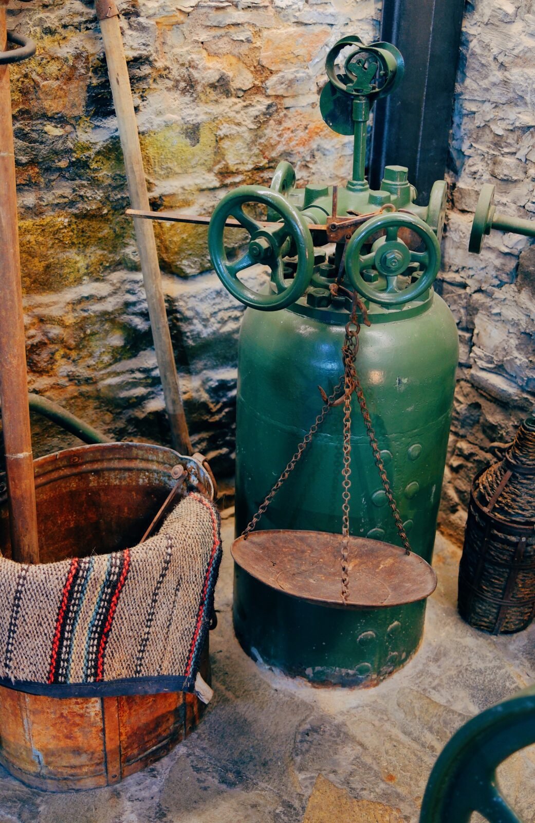 Historic olive press equipment on display at Protoulis olive oil producer, Lesvos
