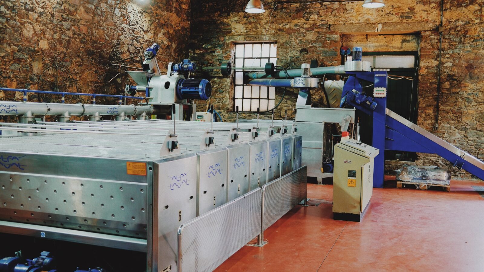 Modern olive oil mill machinery inside the Protoulis olive oil producer, Lesvos
